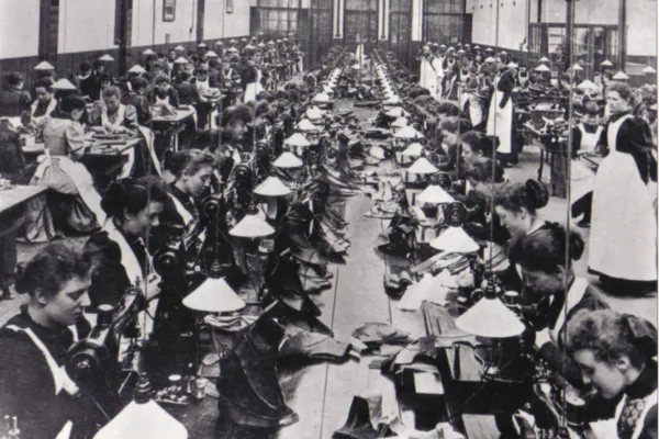 A view inside the bootmaker factory with dozens of women at work