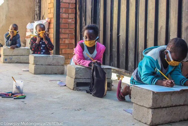 Children wearing masks at school