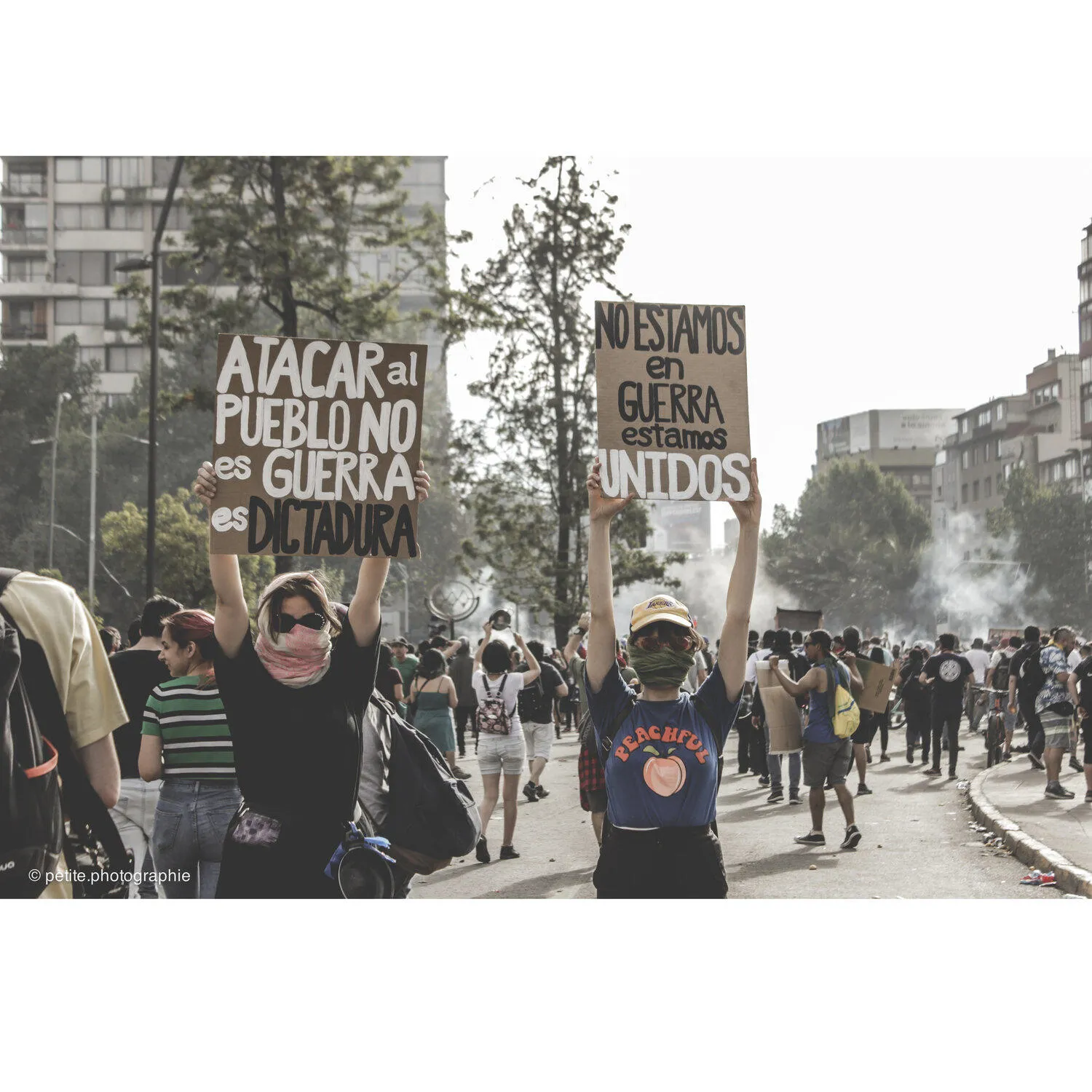 Protesters holding placards