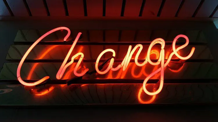 A neon sign saying "Change"