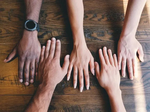 Hands with different skin tones