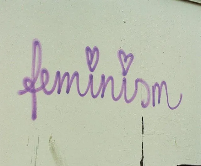 "Feminism" written on a wall