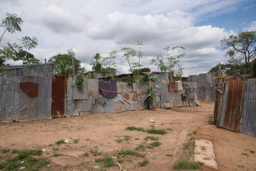 Buildings made from corrugated metal in a community in Abuja, Nigeria