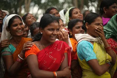 A group of people smiling and laughing