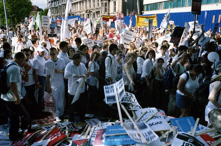 A large group of people with banners